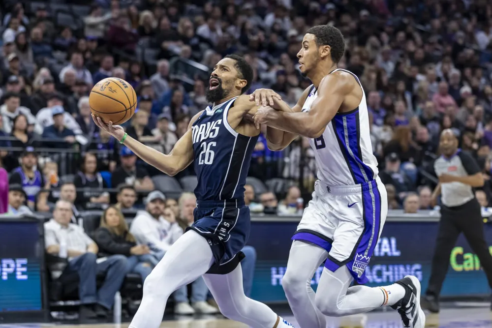 Kings triumph over Mavericks 110-100; Fox nets 33 points, Christie secures first win as interim coach