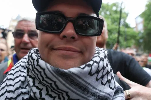 Kneecap Rapper Mo Chara Charged with Terrorism for Displaying Hezbollah Flag