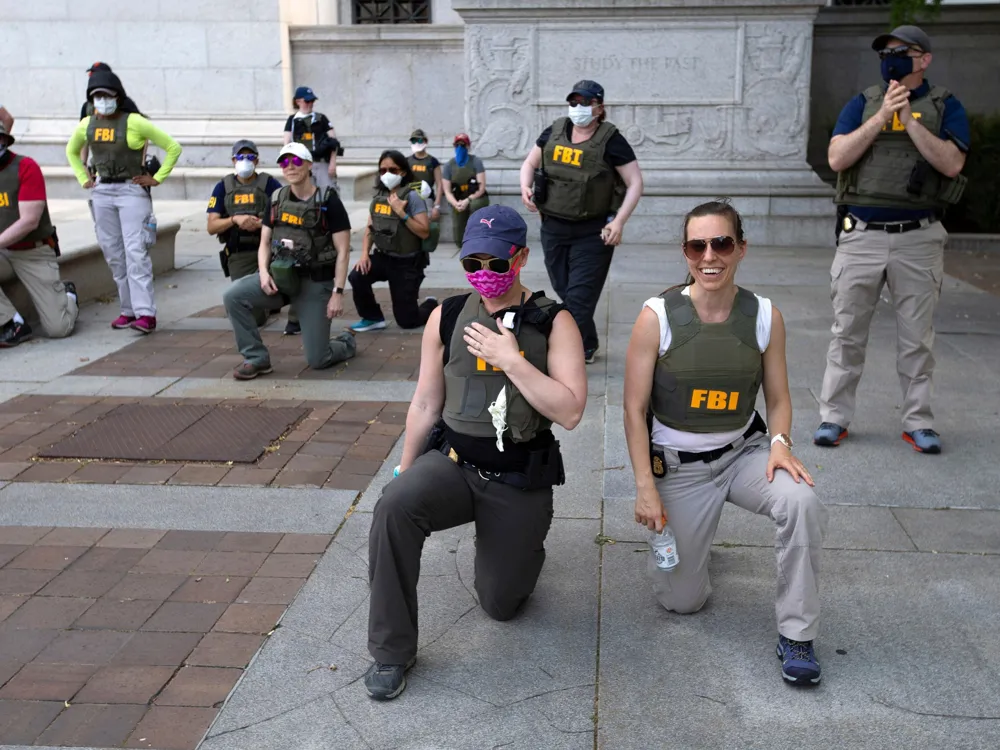Lawsuit Highlights Retaliation Against Ex-FBI Agents Who Kneeled During 2020 Protests