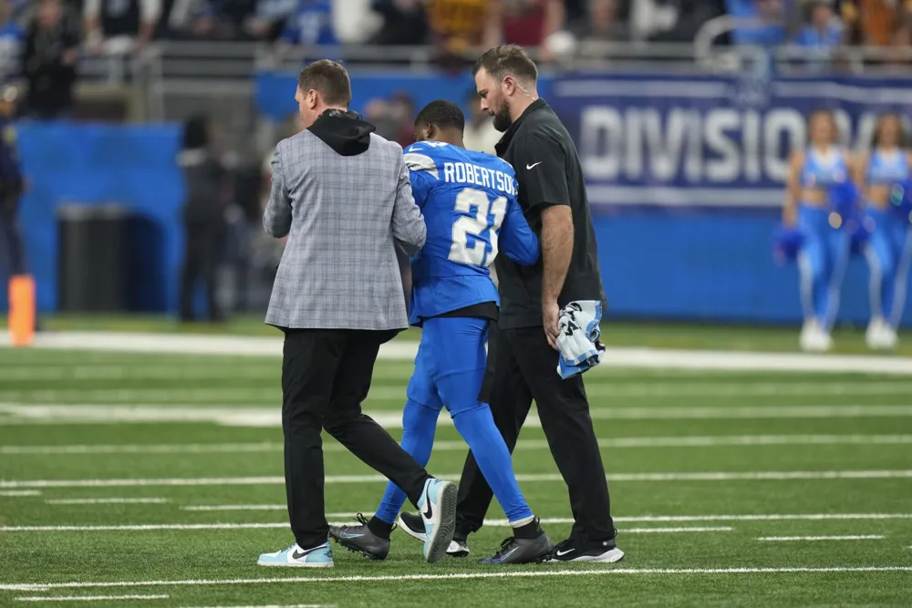 Lions Cornerback Amik Robertson Suffers Serious Elbow Injury Against Commanders