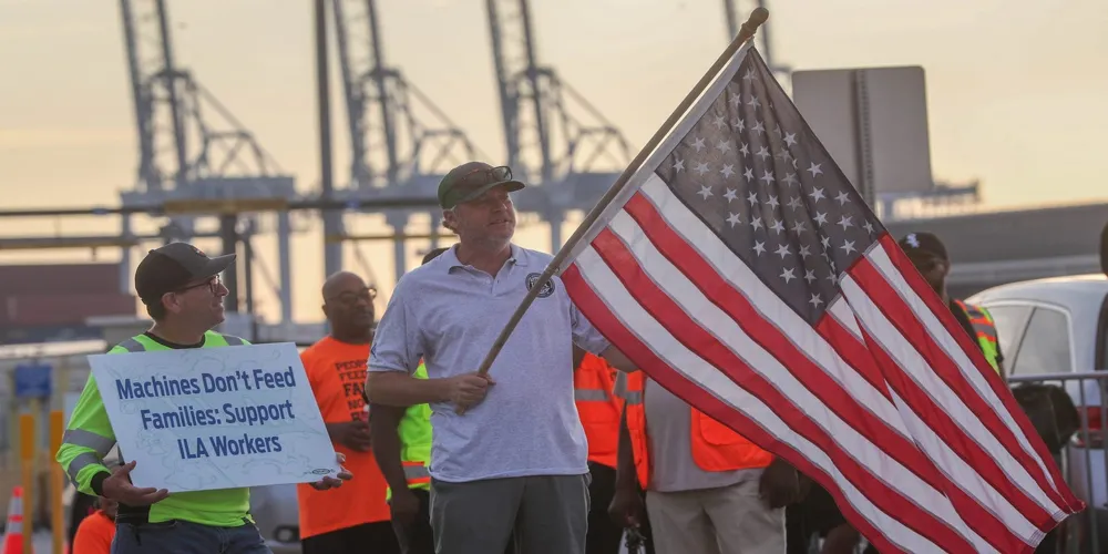 Longshoremen Achieve Tentative Deal, Averting Strike and Economic Disruption