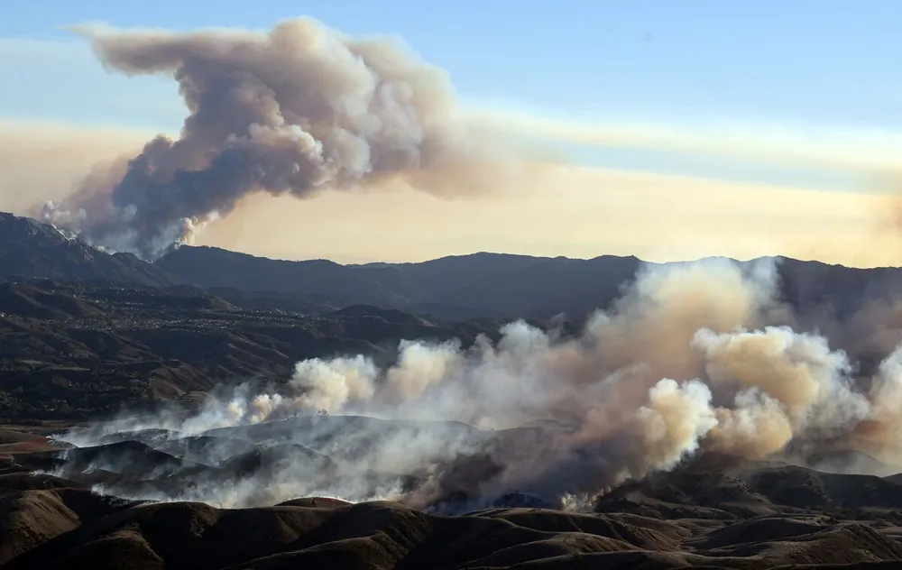 Los Angeles Wildfires: Improving Winds Assist Firefighters in Control Efforts