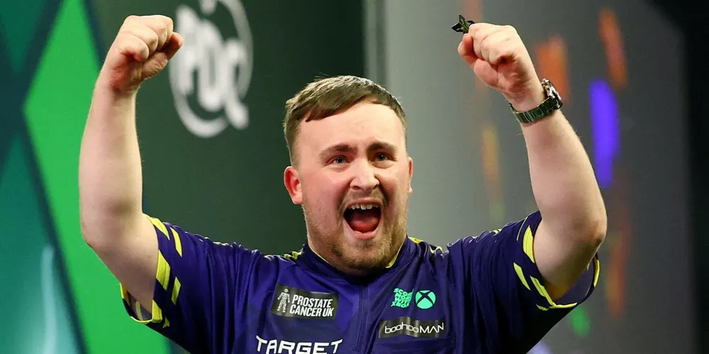 Luke Littler, 17, wins world darts title in lively celebration