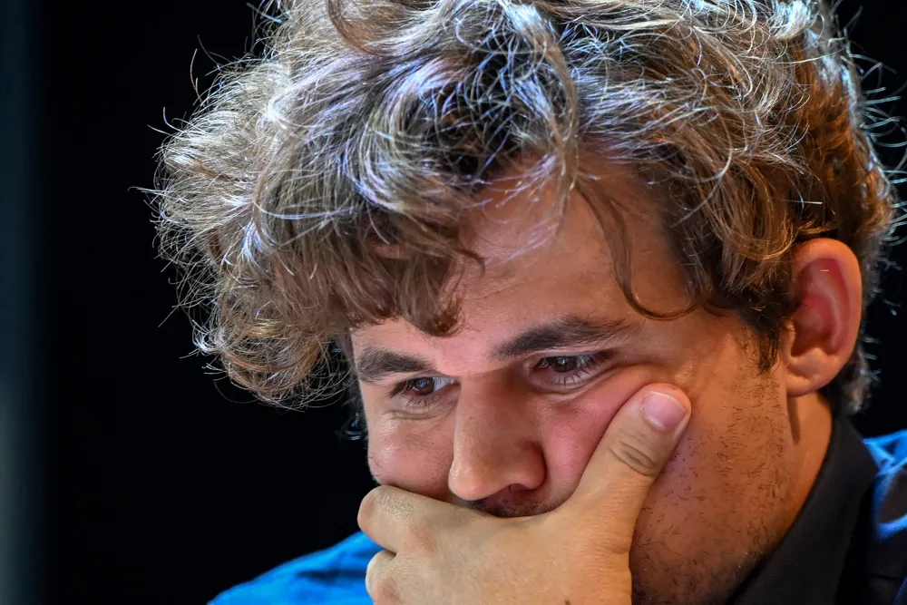 Magnus Carlsen held to a draw by 143,000 chess players in historic showdown