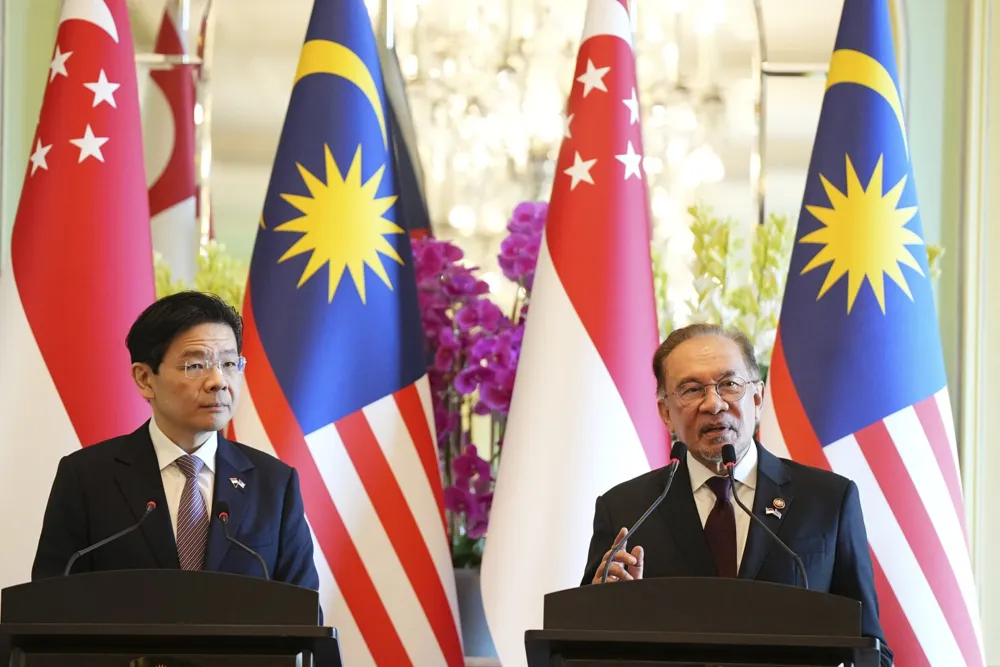 Malaysia and Singapore to establish a special economic zone to boost investment