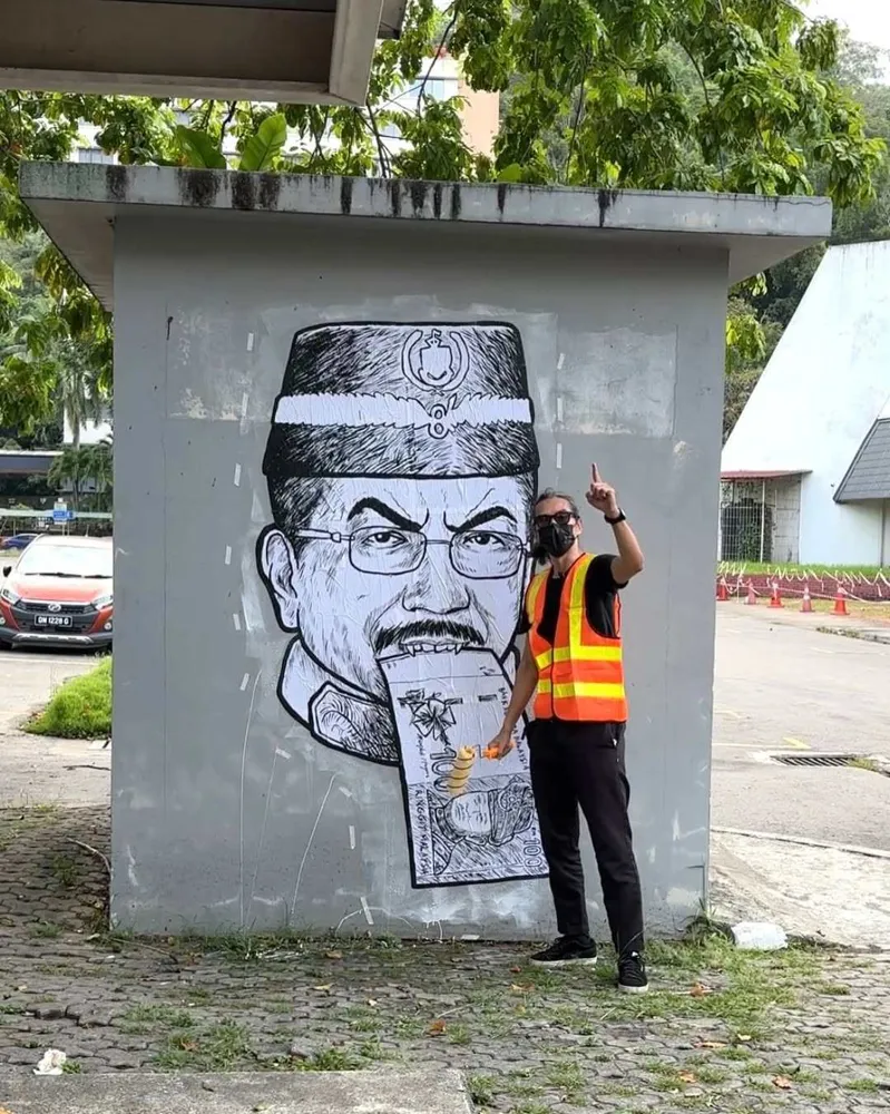 Malaysian satirist Fahmi Reza briefly detained for art mocking Sabah governor