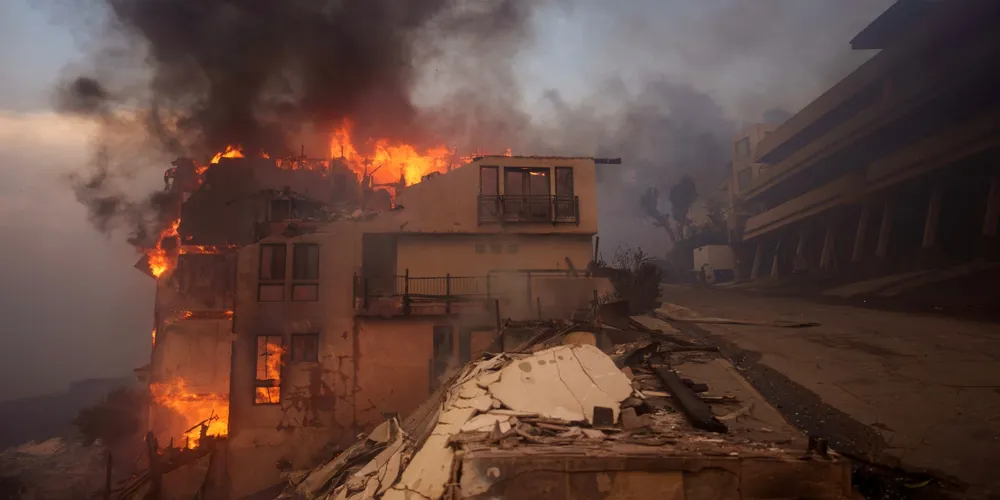 Malibu wildfires cause extensive damage as firefighters battle the blaze