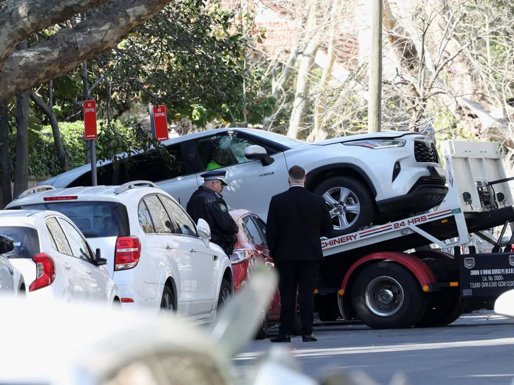 Man arrested after car crashes into Russian consulate in Sydney