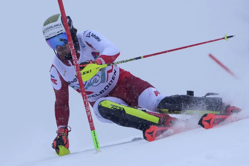 Manuel Feller tops snowy World Cup slalom first run in Adelboden