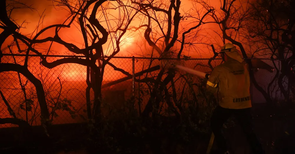 Mass evacuations as wildfires engulf Los Angeles area