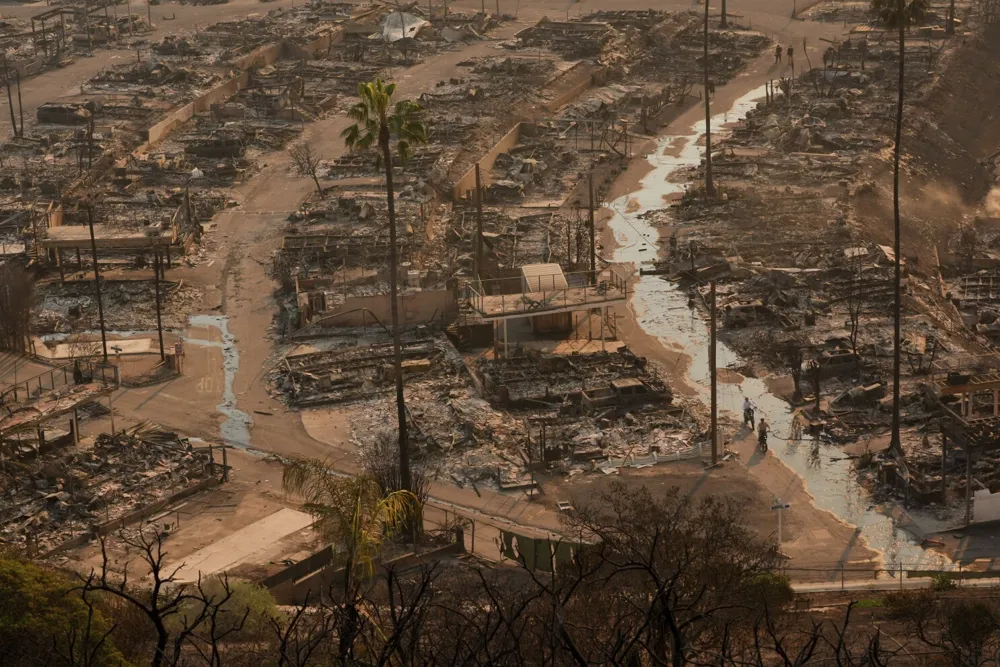 Massive LA wildfires destroy over 10,000 structures and prompt evacuations