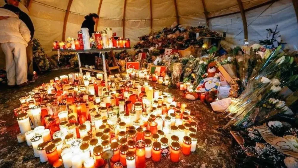 Memorial for Swiss nightclub fire victims engulfed in flames amid ongoing investigation