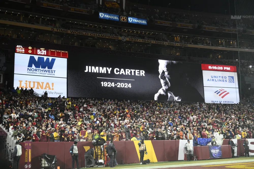 Moment of silence held for Jimmy Carter before Falcons-Commanders matchup