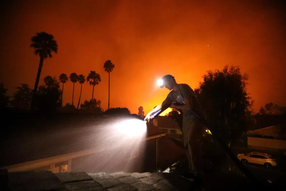 Mother and son bravely combat Palisades fire to protect their home with pump and pool water