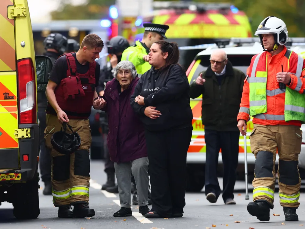 Manchester synagogue attack: victims named as police say one shot by officer; multiple arrests in CT probe