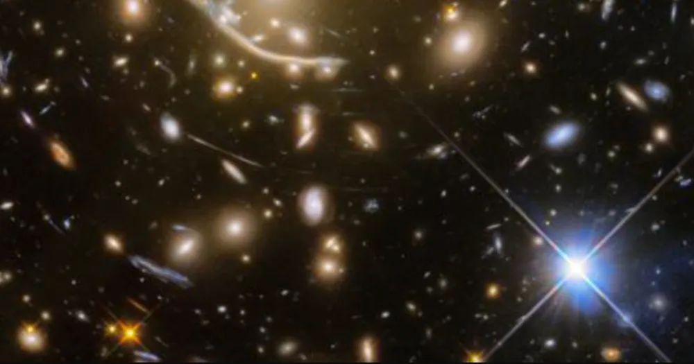 NASA's Webb Telescope Discovers 44 New Stars in Distant Galaxy Using Gravitational Lensing