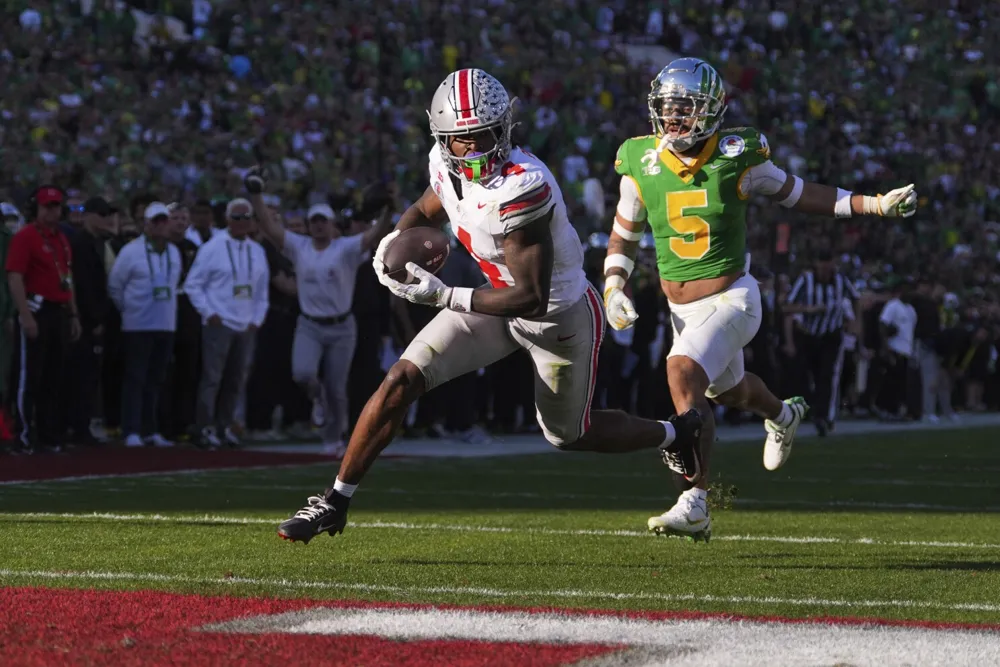 Ohio State and Texas Face Off in CFP Semi at Cotton Bowl for National Championship Bid