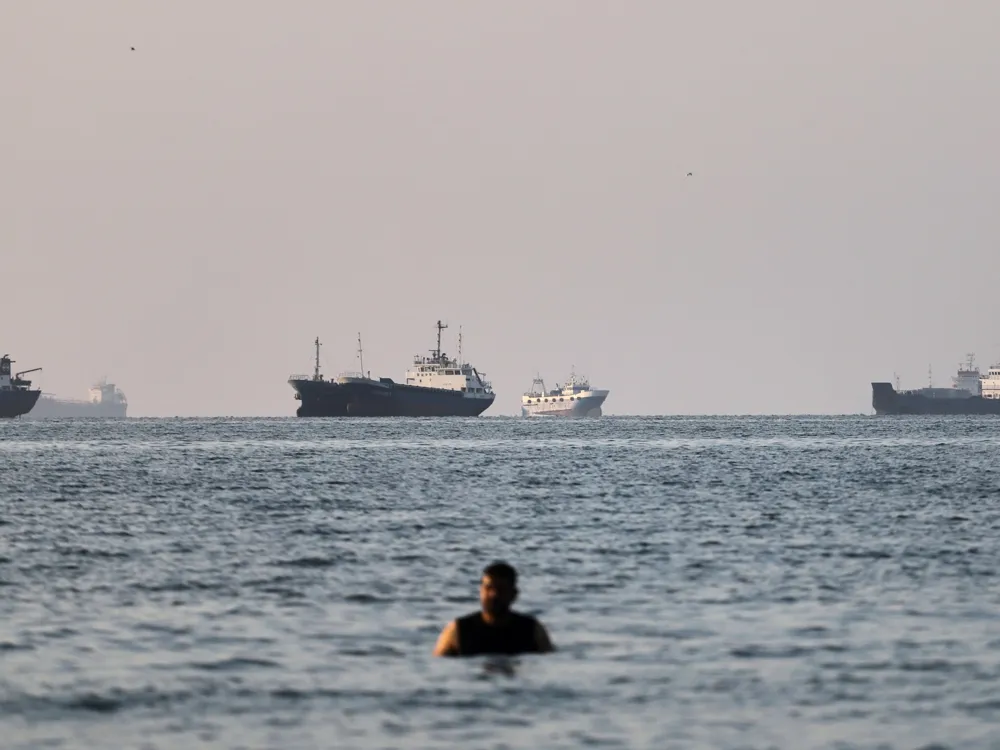 Oil tanker on fire after projectile attack near Strait of Hormuz