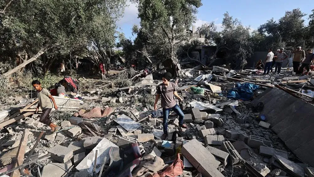 Israeli Strikes Kill Scores in Gaza, Including Children Collecting Water