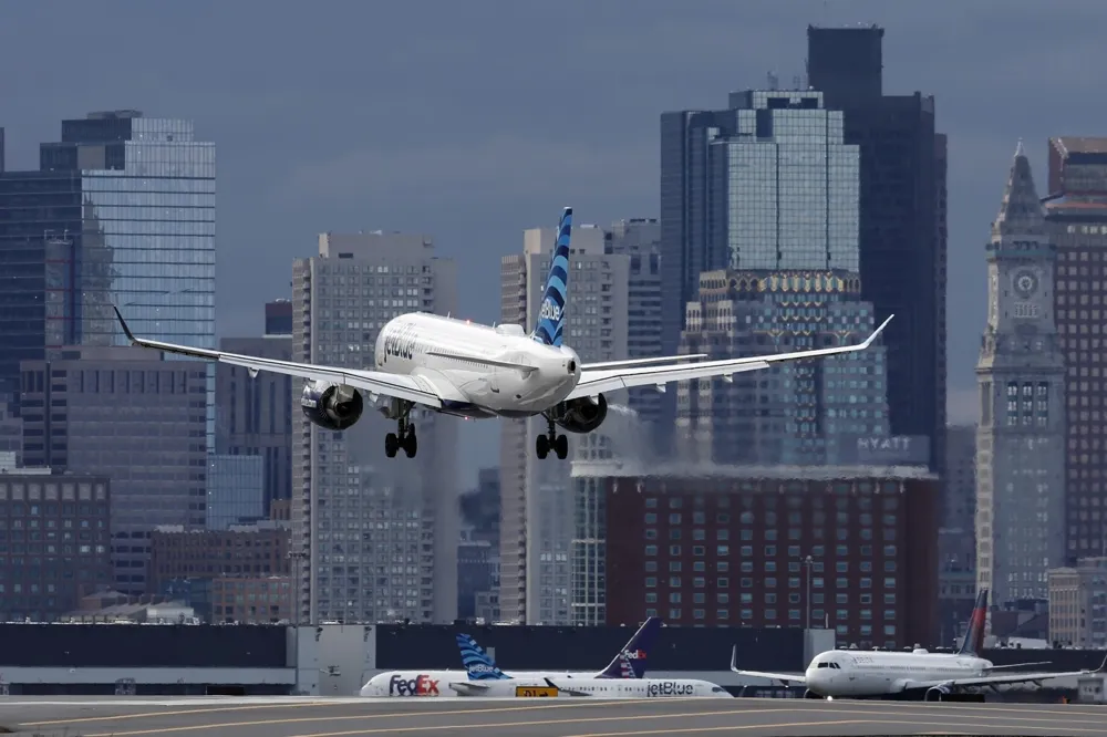 Passenger Opens Exit Door on JetBlue Flight at Boston Airport, Prompting Emergency Response