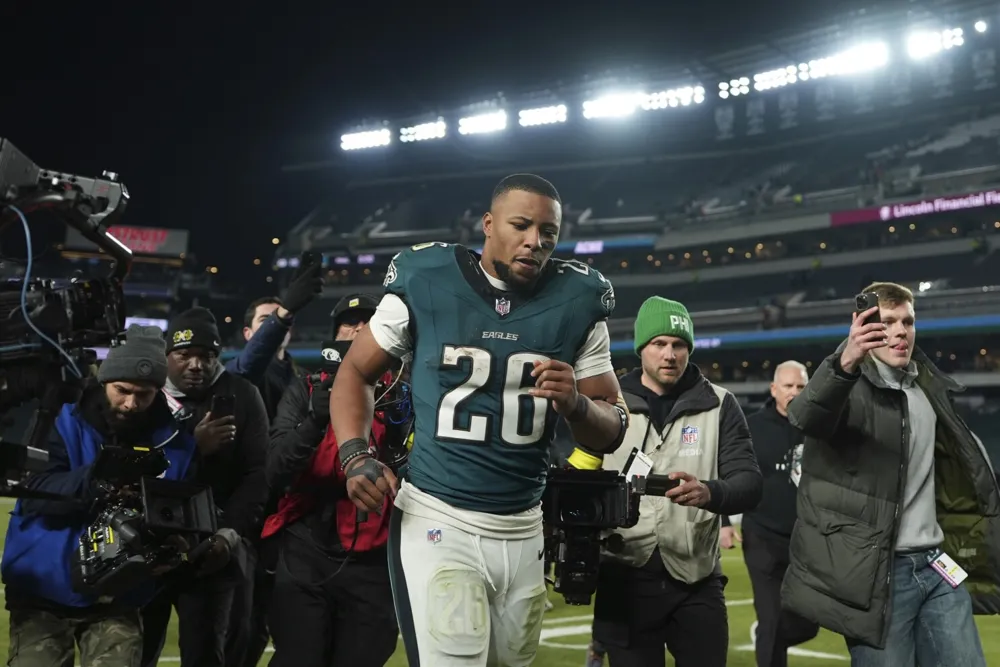 Rams Prepare for Challenging Playoff Showdown Against Eagles and Star RB Saquon Barkley