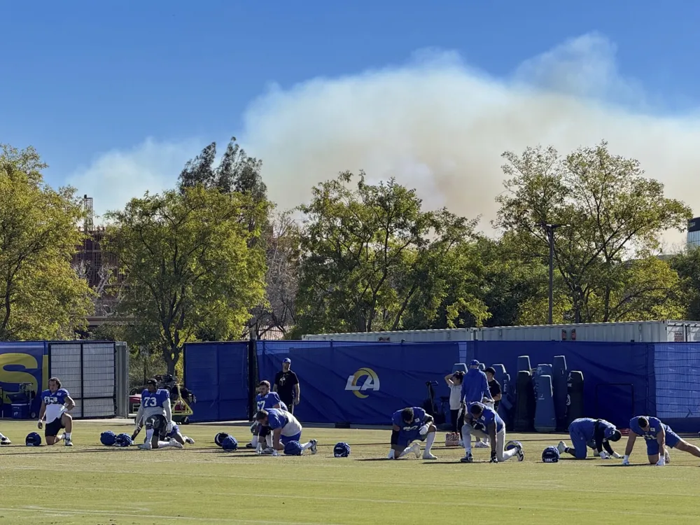 Rams Travel to Arizona for Playoff Amid Hometown Wildfires