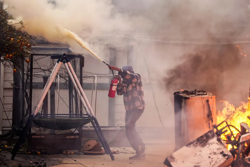 Residents of Altadena Fight Flames as Firefighters Face Shortages