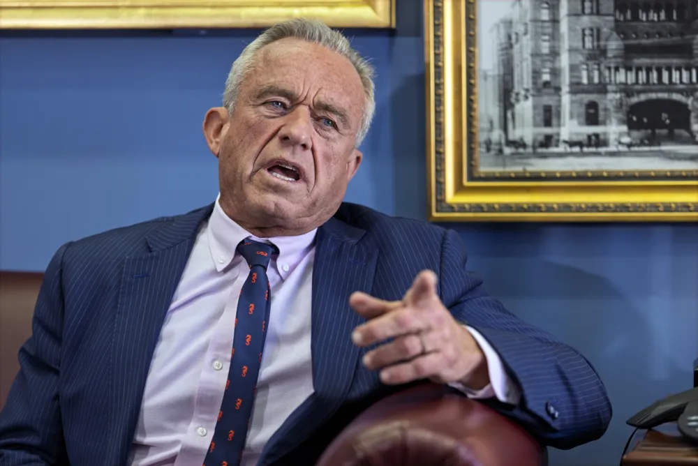 Controversial Nominee Robert F. Kennedy Jr. Faces Confirmation Hearings Amidst Vaccine Skepticism and Familial Criticism