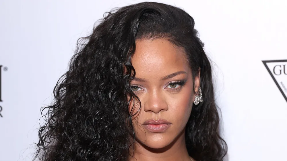 Rihanna Claps Back at Fan's Insult While Demanding New Music