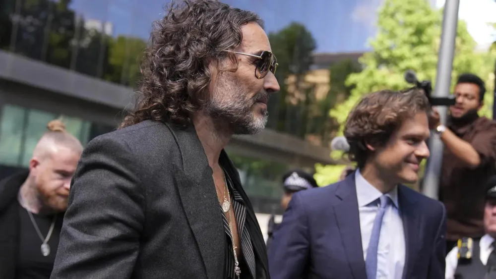 Russell Brand pleads not guilty to multiple sexual assault charges