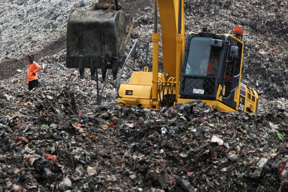 Search and rescue efforts ongoing after Indonesia's landfill collapse kills four