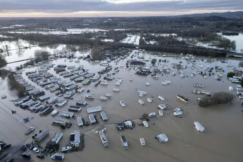 Severe flooding and snow disruption wreak havoc across the UK