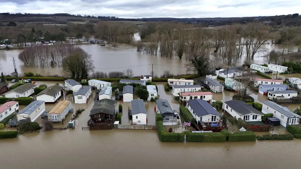 Severe floods and winter storms halt UK activities, 60 rescued