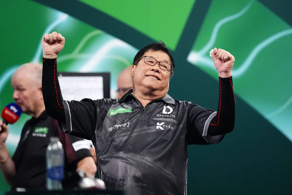 Singapore's Paul Lim, 71, Makes History as Oldest Match Winner in World Darts Championship