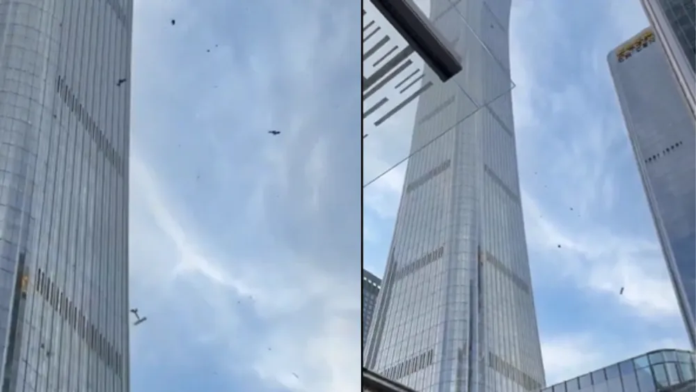 Small aircraft crashes into Beijing's tallest skyscraper, prompting heavy police response