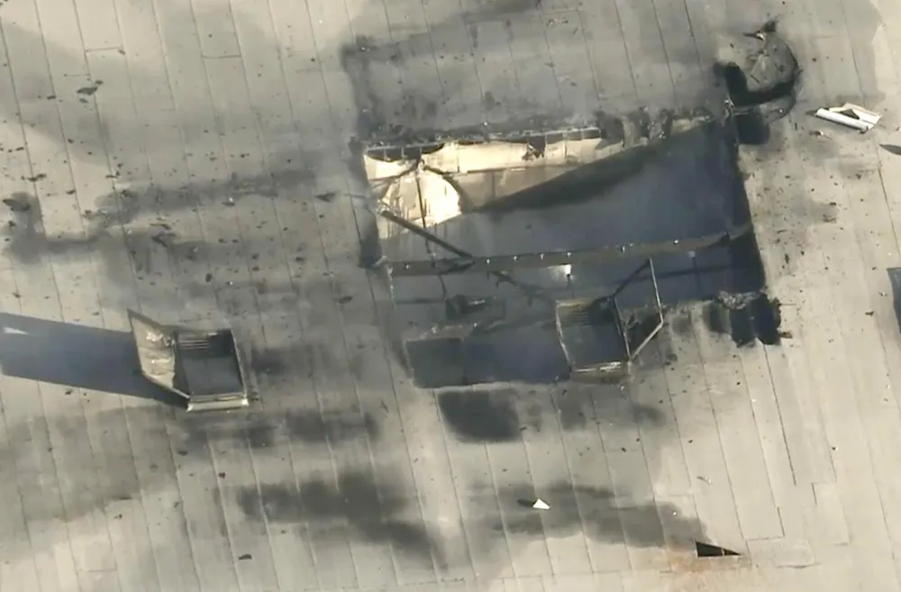 Small plane crash near Fullerton airport injures 15 and ignites fire in warehouse