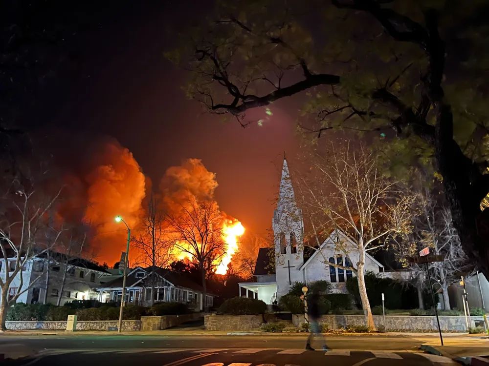 Southern California Wildfires Force Mass Evacuations as Ash Rains Down