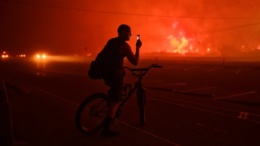 Southern California's Wildfires Force Widespread Evacuations Amid Strong Winds