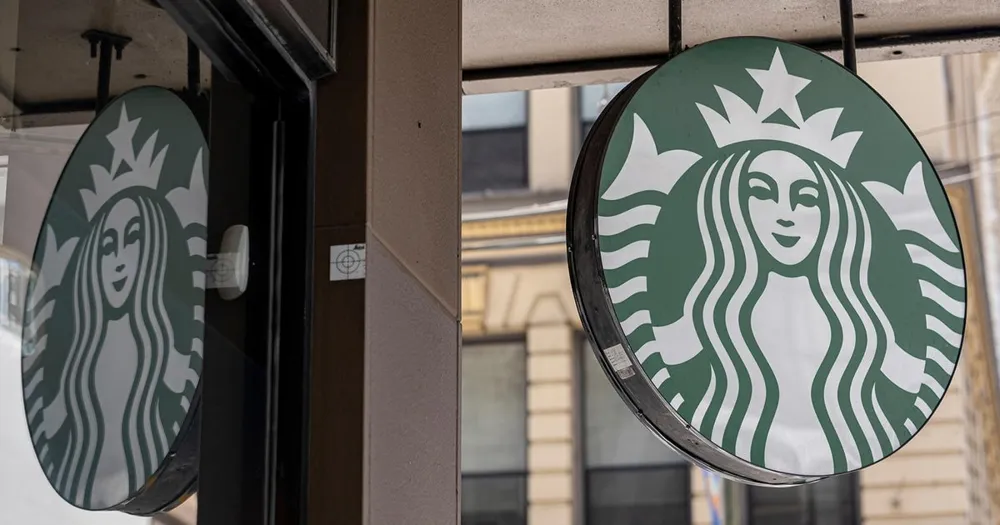 Starbucks to close 1% of stores and lay off 900 employees in restructuring plan