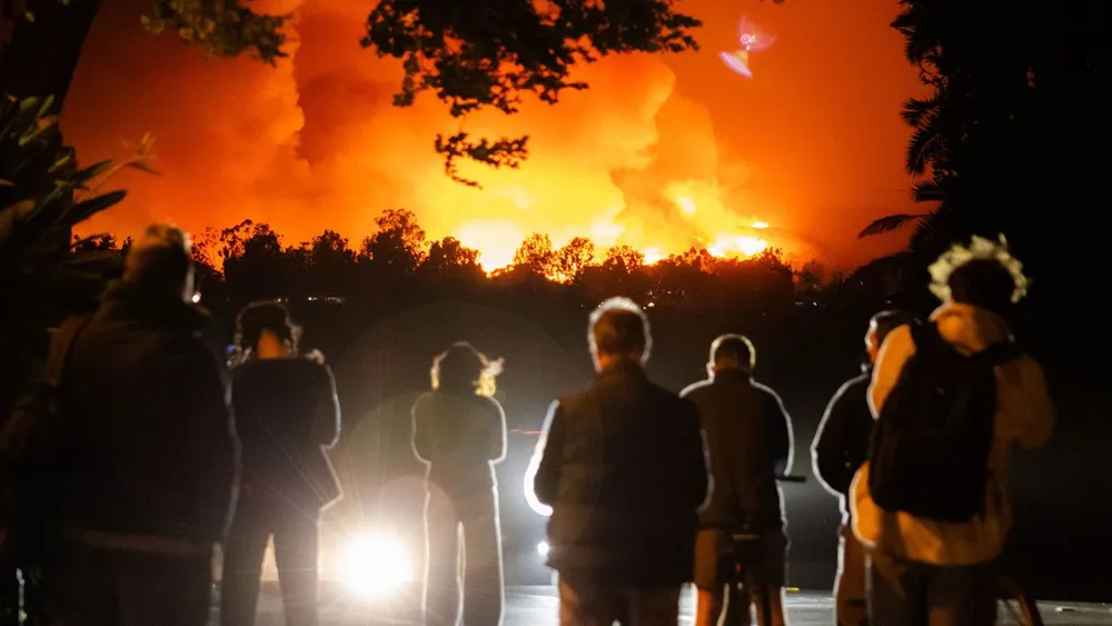 State of emergency declared as massive fire ravages affluent Los Angeles neighborhood