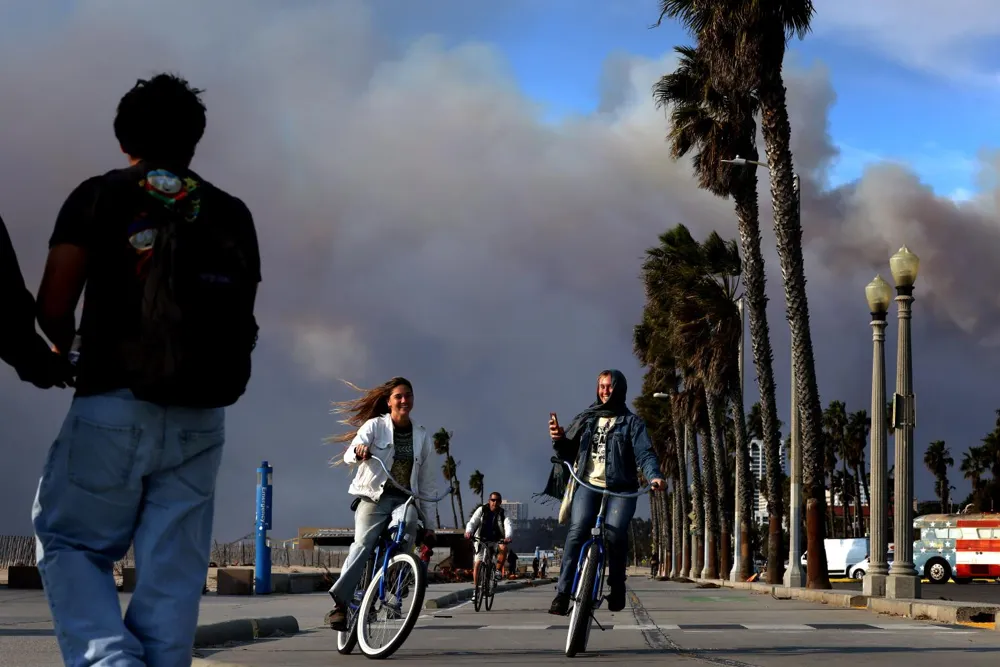 Strong winds reignite fire concerns as Los Angeles County battles wildfires