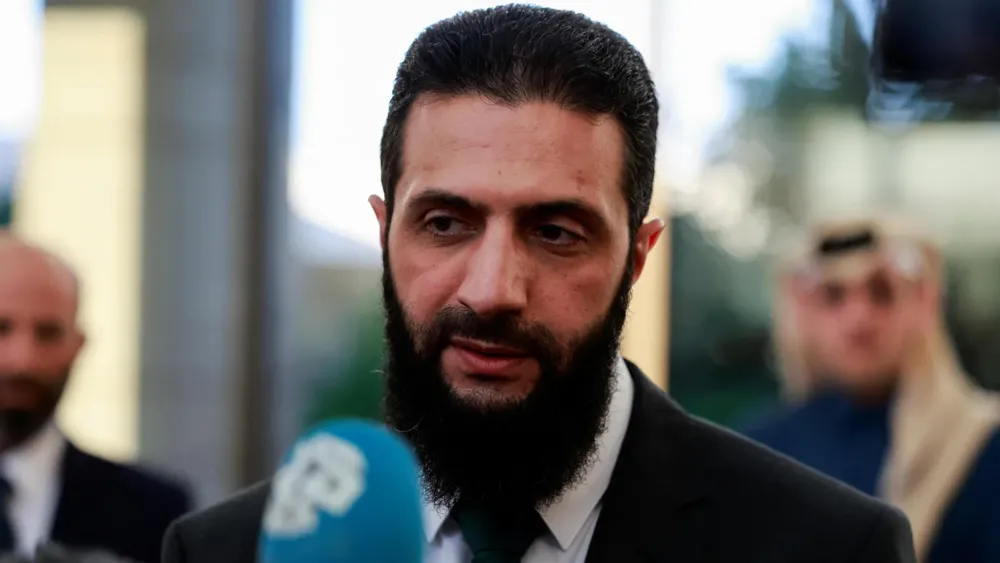 Syria's Rebel Leader Predicts Up to Four Years for New Elections