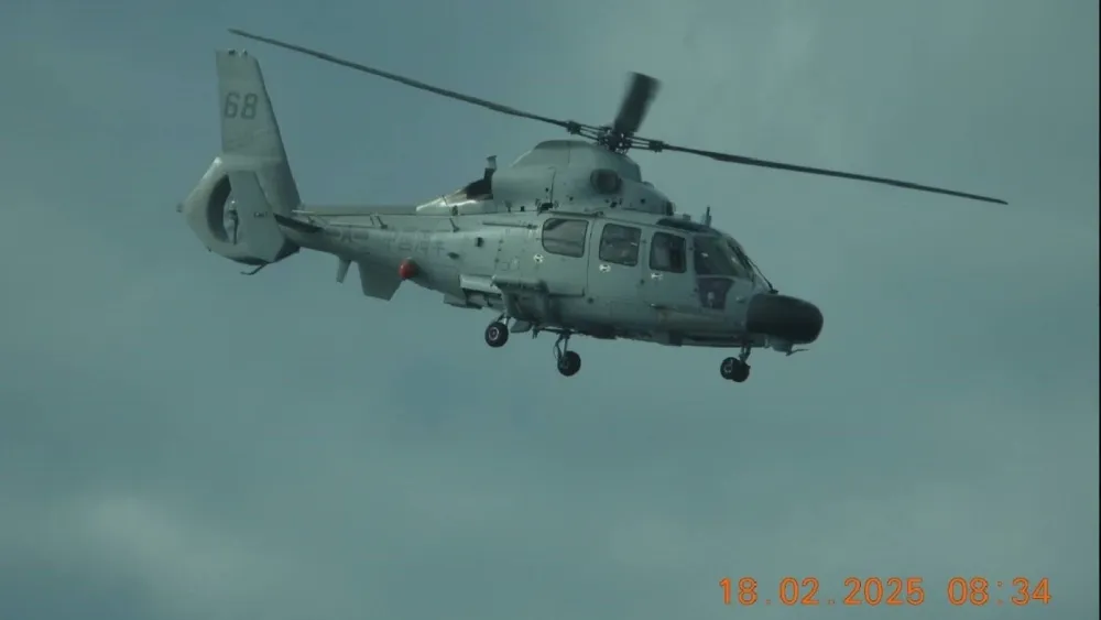 Close Encounter: Chinese Helicopter Flies Within Feet of Philippine Plane Over Scarborough Shoal