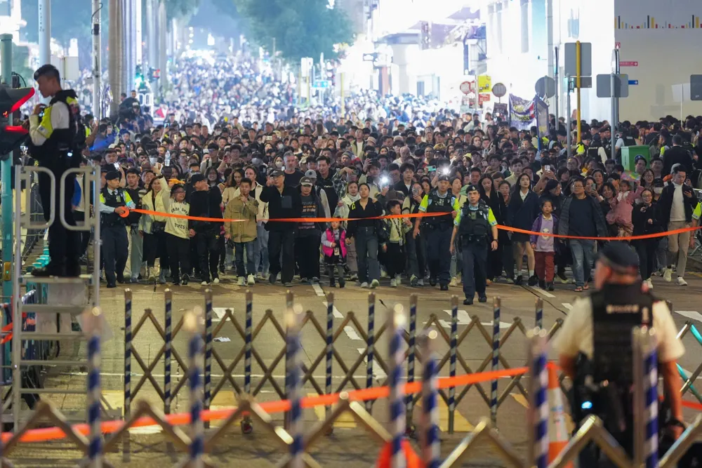 Thousands Gather for Countdown to New Year’s Eve Fireworks in Hong Kong