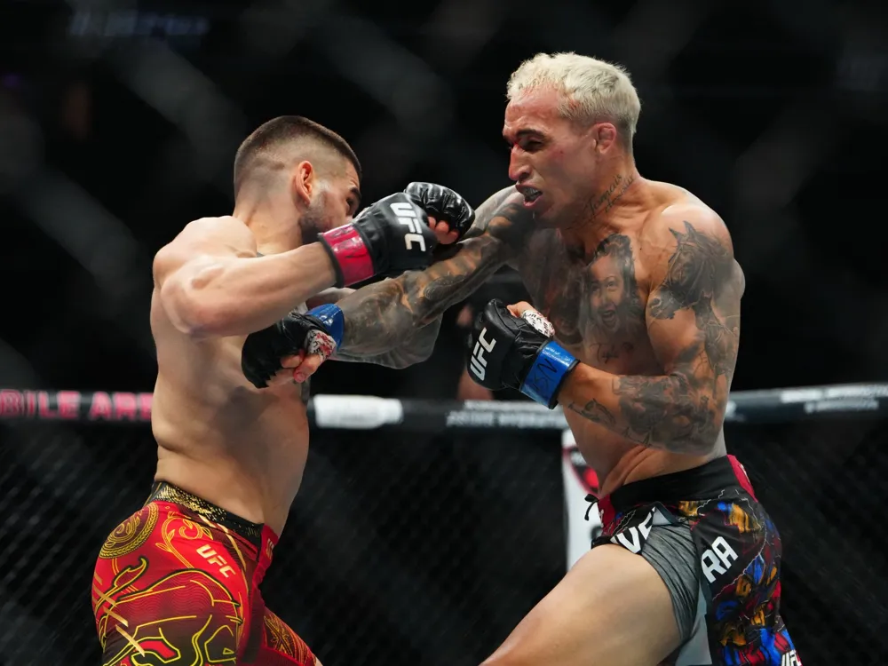 Topuria secures UFC lightweight title with first-round knockout of Oliveira