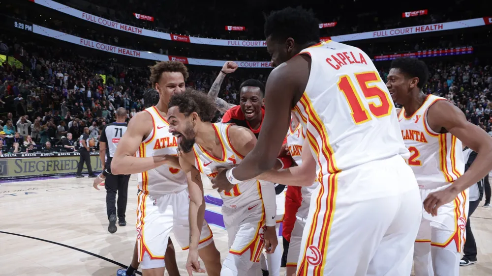 Trae Young Scores Incredible Half-Court Buzzer-Beater to Seal Victory