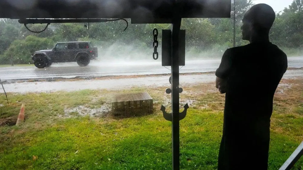 Tropical Storm Edouard Hits Texas-Louisiana Border, Causing Flooding and Power Outages