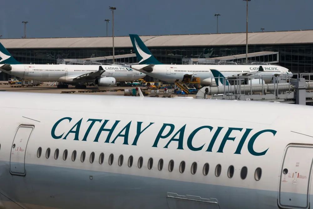 Two Cathay Pacific Passengers Face Charges After In-Flight Scuffle