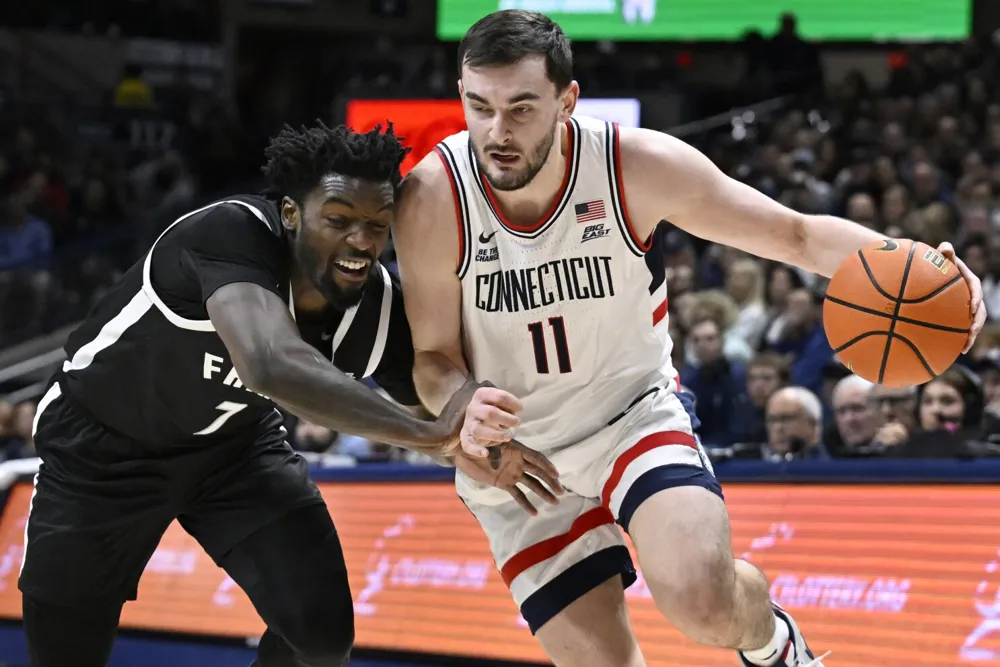 UConn rallies from 14-point deficit to defeat Providence 87-84, maintains perfect Big East record