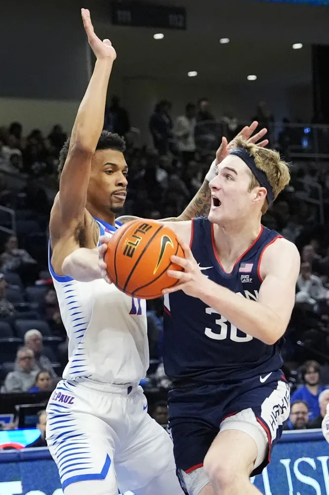 UConn's Liam McNeeley injures right ankle during win over DePaul